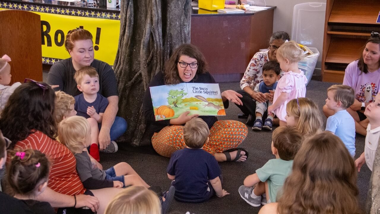 Ms. Jessica reading to kids at Florence-Lauderdale Public Library