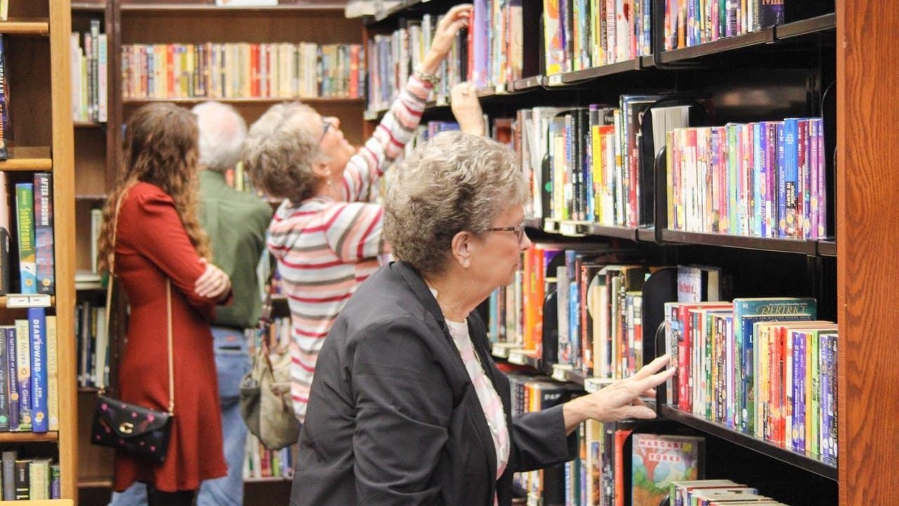 Customers shopping at the Friends Bookstore in the Florence-Lauderdale Public Library